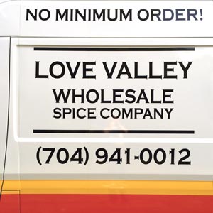 Side of Love Valley Wholesale Spice Company's Delivery Truck